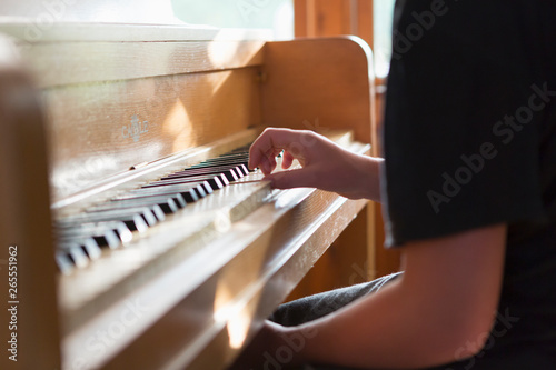 13 year old girl playing piano photo
