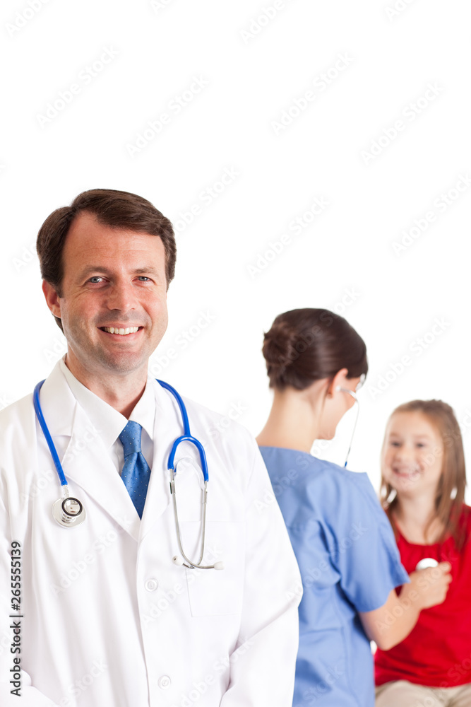Doctor and Nurse Examining a Little Girl - Medical Healthcare Doctor and Nurse Examining a Little Girl - Medical Healthcare