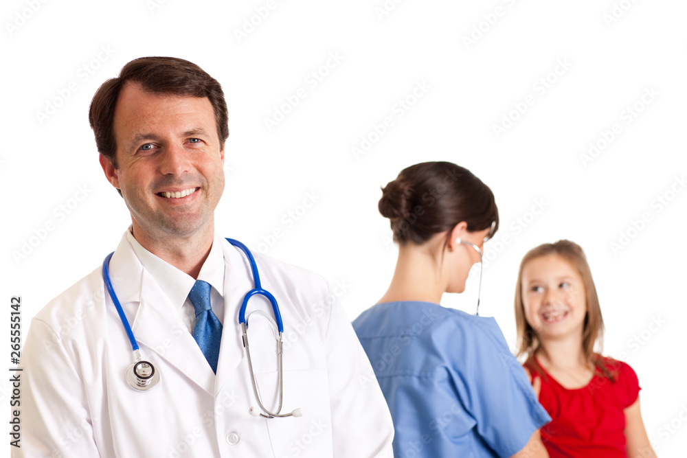 Doctor and Nurse Examining a Little Girl - Medical Healthcare Doctor and Nurse Examining a Little Girl - Medical Healthcare