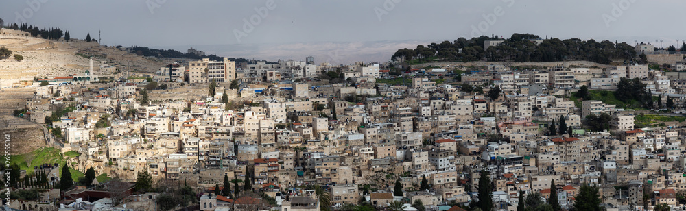 Aerial panoramic cityscape view of residential neighborhood during a cloudy day. Taken in Jerusalem, Israel.