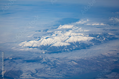 Aerial view of mountains covered by snow