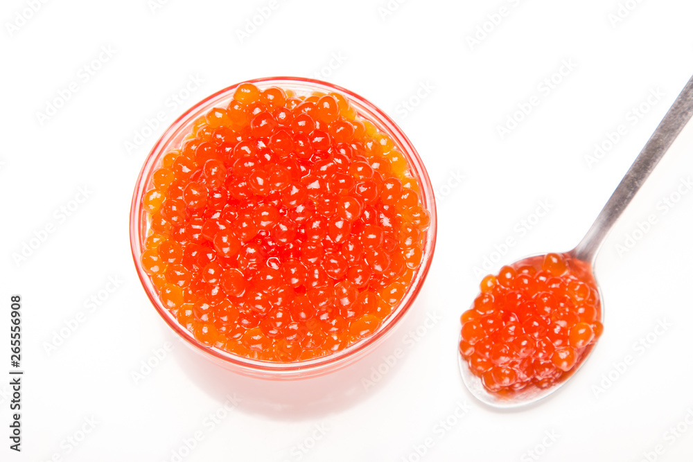 red caviar in glass bowl with spoon isolated on white background red caviar in glass bowl with spoon isolated on white background