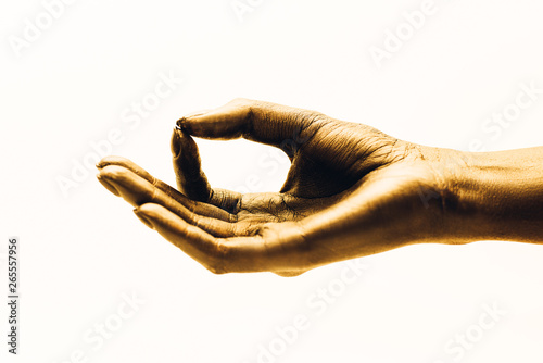 Image of woman hand in gyan mudra. Golden on a white background