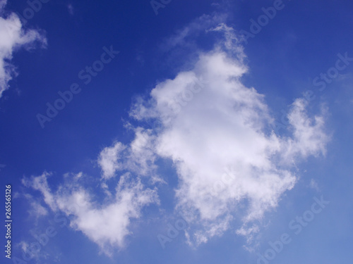 bright blue sky in germany and a fluffy cloud