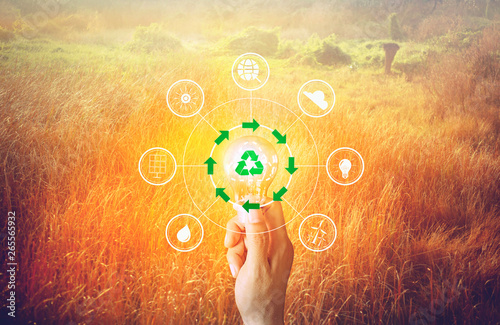 Hand lamp, energy saving concept, technology and environmental conservation