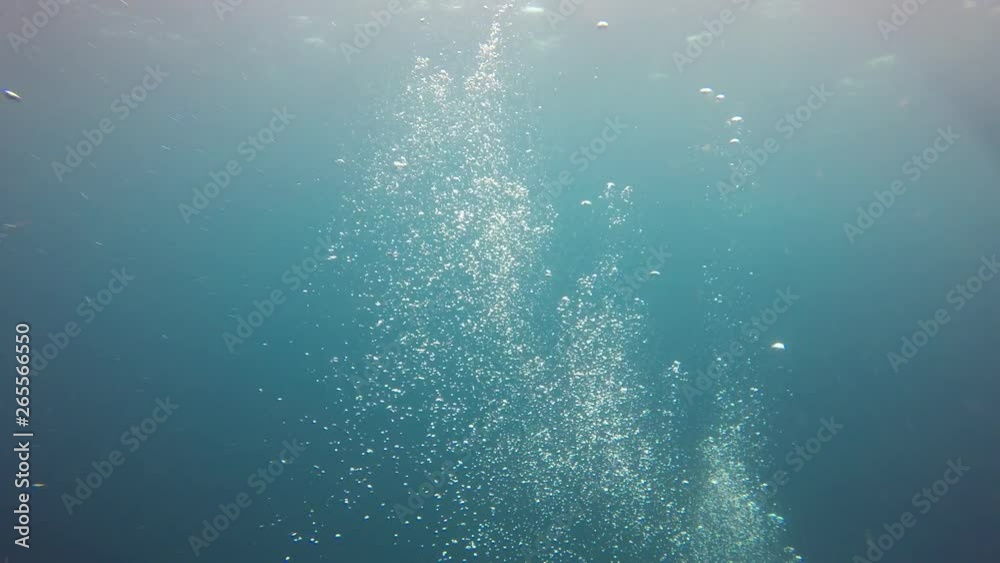 Underwater video of air bubbles rising in sea Underwater video of air bubbles rising in sea