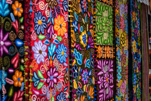 Colorful Peruvian artisanal textiles cloth with inca and traditional patterns for sale at street Indian market in Miraflores, Lima.