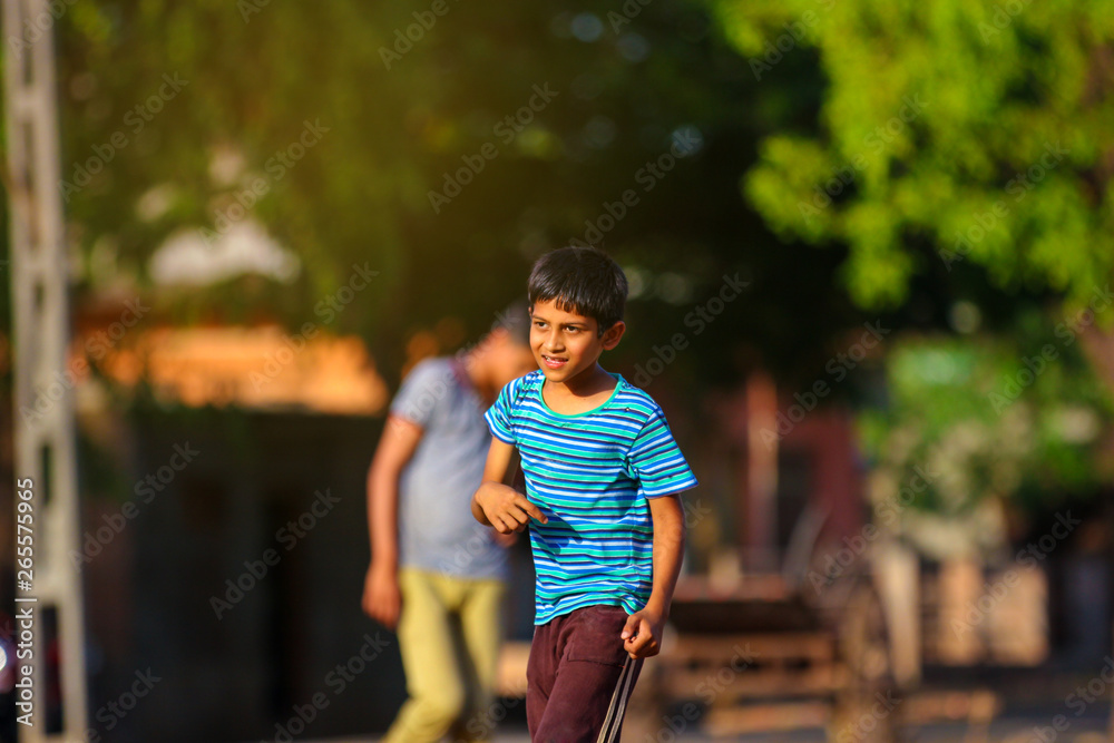Rural Indian Child Playing Cricket Rural Indian Child Playing Cricket