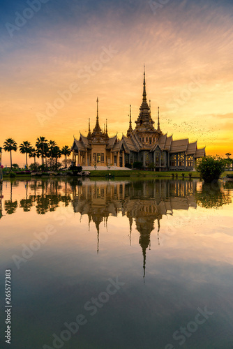 A beautiful sunset view of temple in reflection in twilight    Nakorn ratchasrima   Thailand