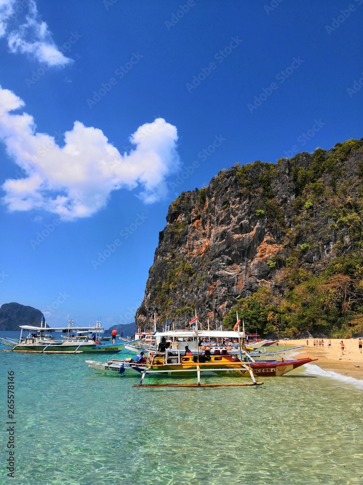 Typical Philippine boats for touristi trips waiting for their customers