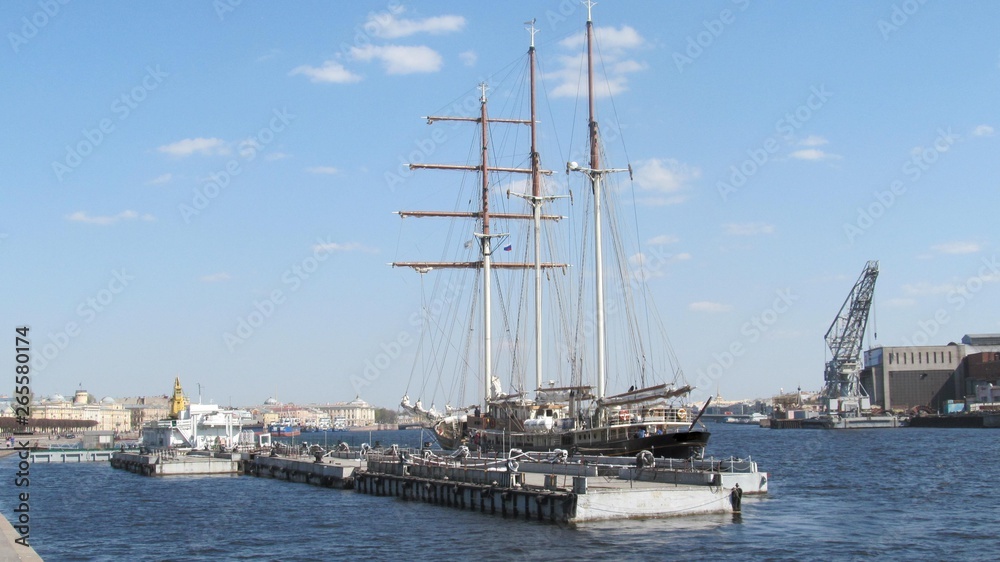 the sailboat moored to the pier of St. Petersburg  