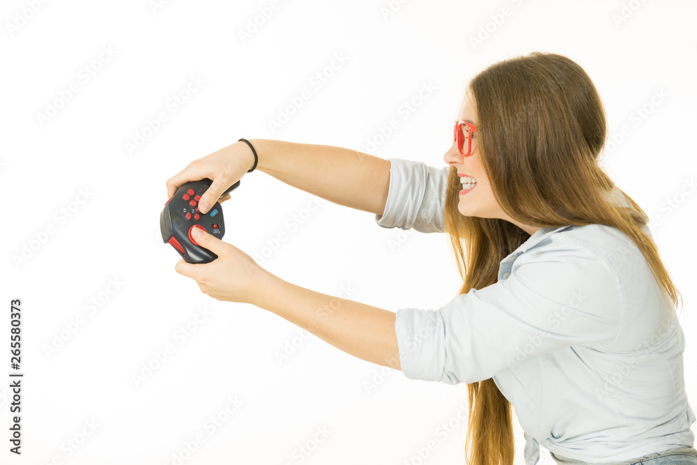 Profile view of woman playing video games Profile view of woman playing video games