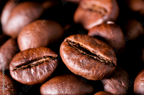 Brown roasted coffee beans seeds background texture