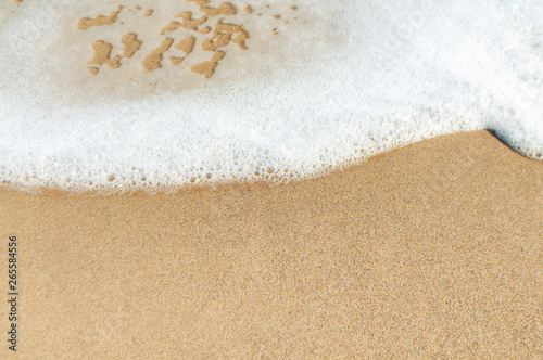 Place for the inscription on the sea wet sand