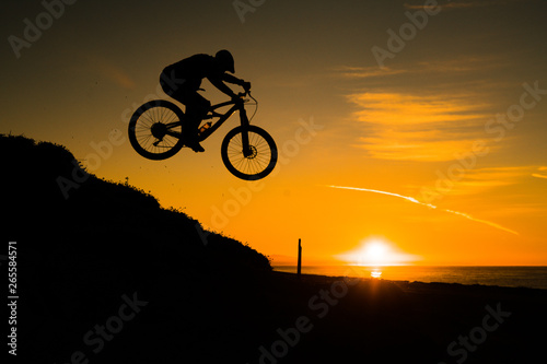silhouette of cyclist