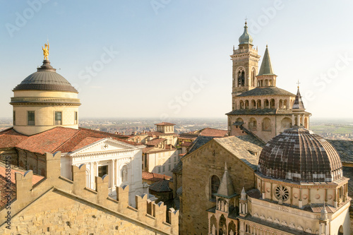 Bergamo Upper City, Italy, march 2019. The two main churches of this city, the Duomo and Santa Maria Maggiore, seen from the "Campanone" the town hall bell tower. 