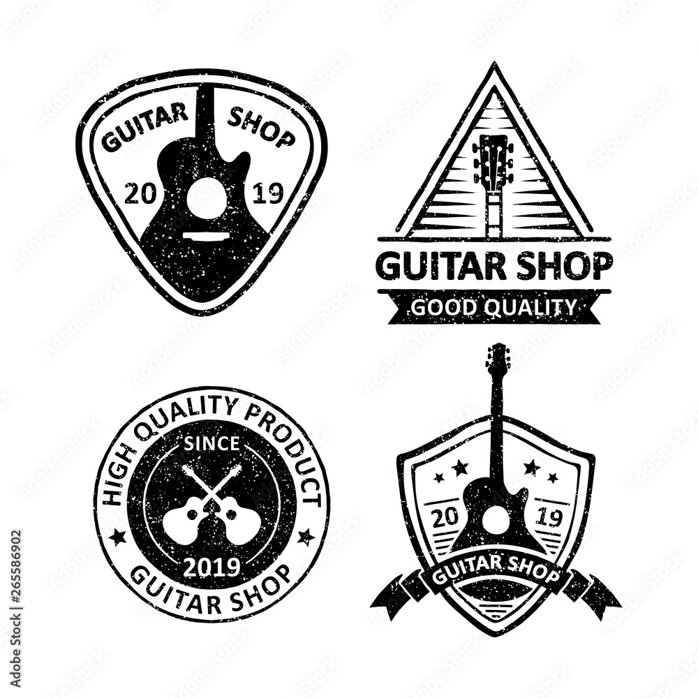 set of vintage guitar shop badges
