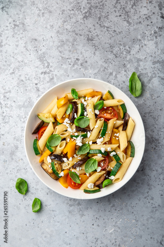 Canvas Print pasta salad with grilled vegetables ( zucchini, eggplant, bell pepper ant tomato