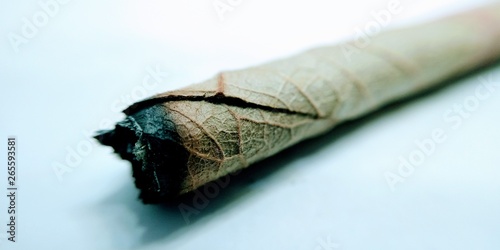 Burned bidi on white background