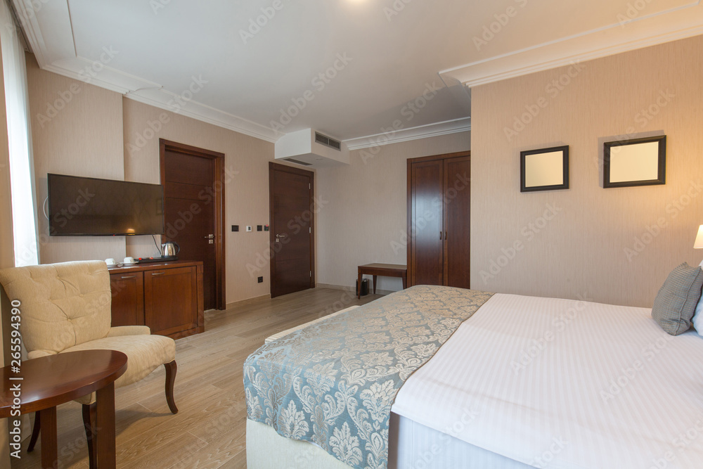 Fototapeta premium Interior of a luxury double bed hotel bedroom