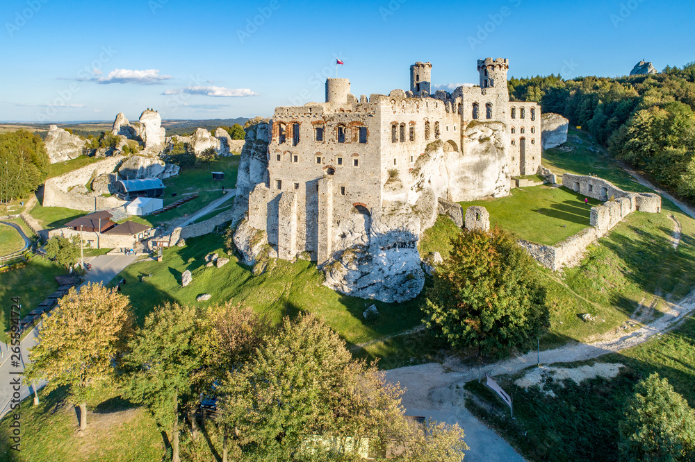 The ruins of medieval castle on the rock in Ogrodzieniec, Poland. One of strongholds  called Eagles Nests in Polish Jurassic Highland in Silesia. Aerial view