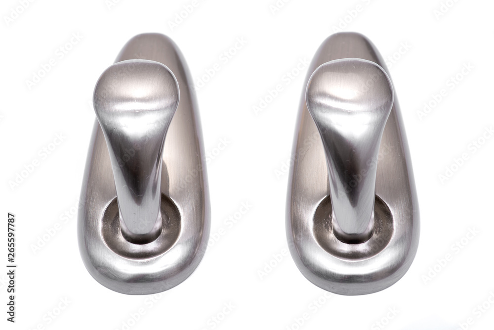 Brushed Nickel Metal Wall Hook with Damage-Free Hanging isolated on white background. Brushed Nickel Metal Wall Hook with Damage-Free Hanging isolated on white background.