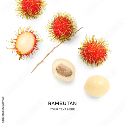 Creative layout made of rambutan on white background. Flat lay. Food concept. photo