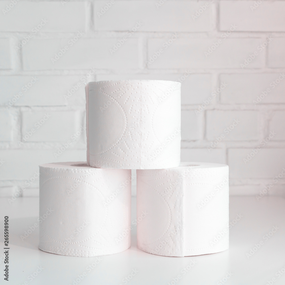 Stack of toilet paper rolls. Concept of body care, disposables, paper hygienic products. Stack of toilet paper rolls. Concept of body care, disposables, paper hygienic products.