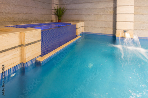 Swimming pool in hotel spa and wellness center