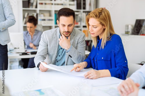 Group of business people working as team in office