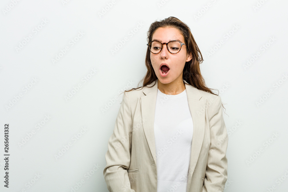Young european business woman being shocked because of something she has seen. Young european business woman being shocked because of something she has seen.