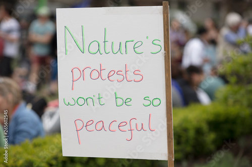 Nature's protests wont be so peaceful climate change protest banner photo