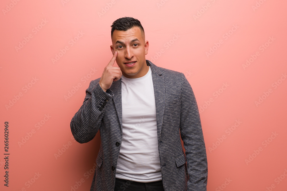 Young elegant latin man thinking about an idea Young elegant latin man thinking about an idea