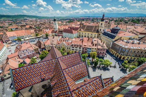 Holy Trinity Church and Council Tower in Sibiu city, view from the bell tower of St Mary Cathedral, Romania photo