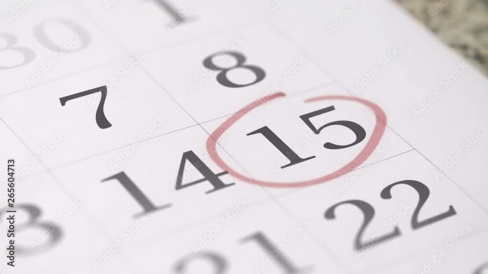 Mark on the fifteenth 15 day of a month in the calendar, close-up Mark on the fifteenth 15 day of a month in the calendar, close-up