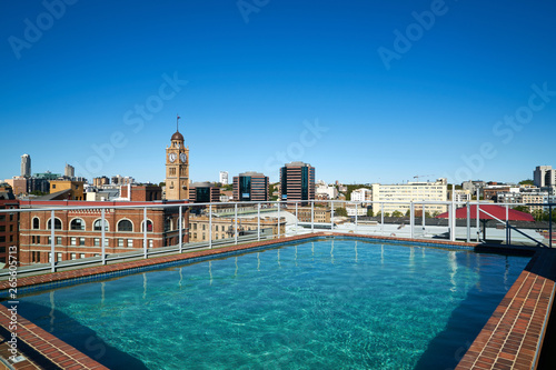 a swimming pool on the roof of a building