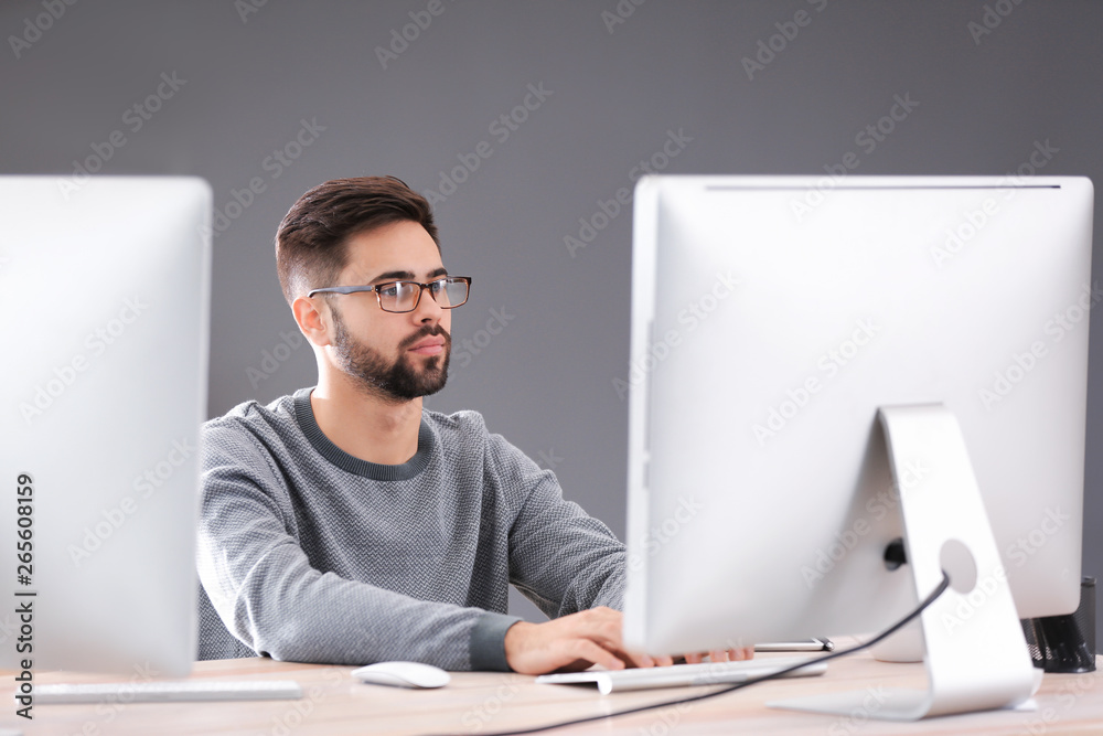 Male programmer working in office Male programmer working in office