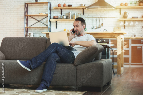 Handsome mature man working...