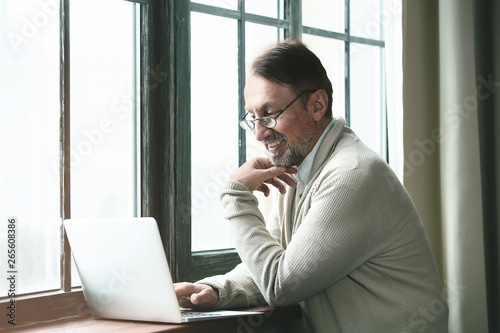 Handsome mature man with la...