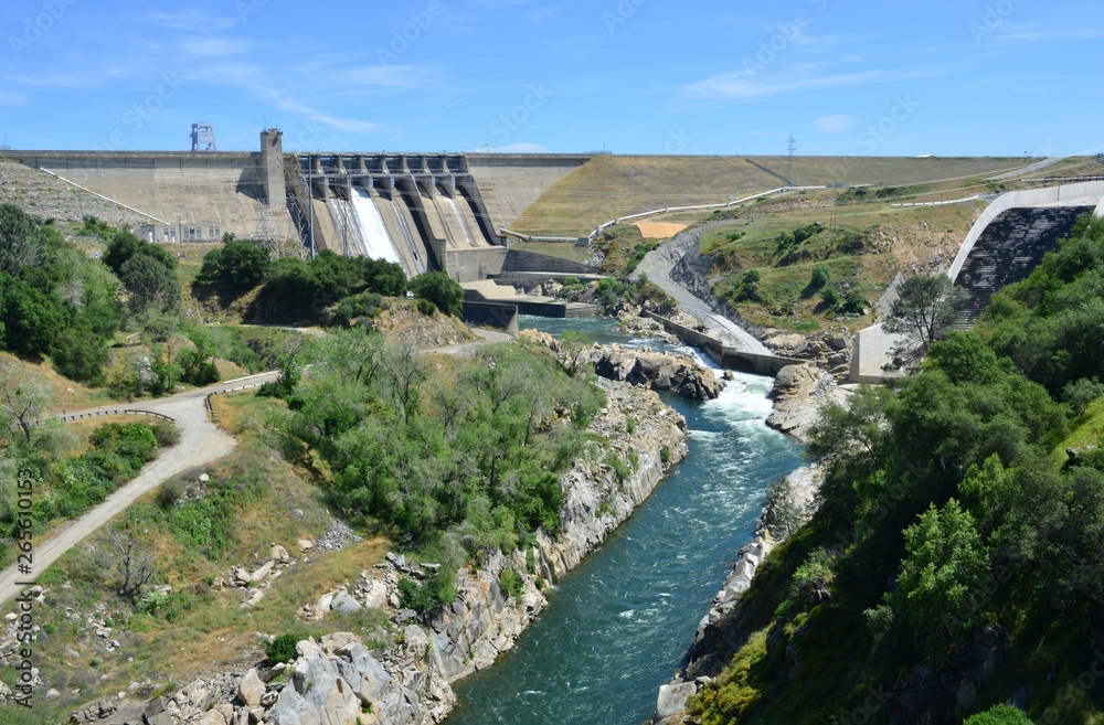 Folsom Dam in California with a sluice gaten open..