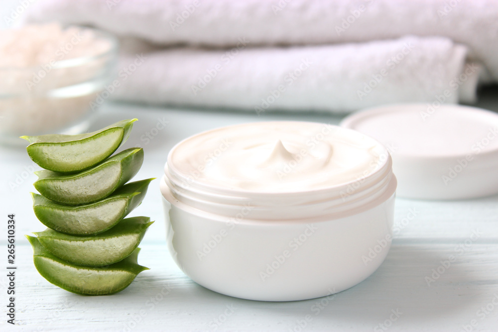 cream with aloe vera on a light background. Aloe vera skin care. Moisturizing and skin care. cream with aloe vera on a light background. Aloe vera skin care. Moisturizing and skin care.