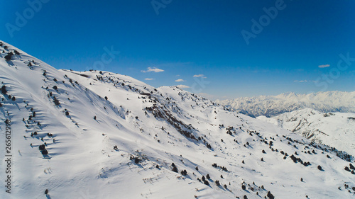 Vahdat district beautiful view from the aircraft to the mountains in Tashkent, china and Kirgistan, covered with snow. photo