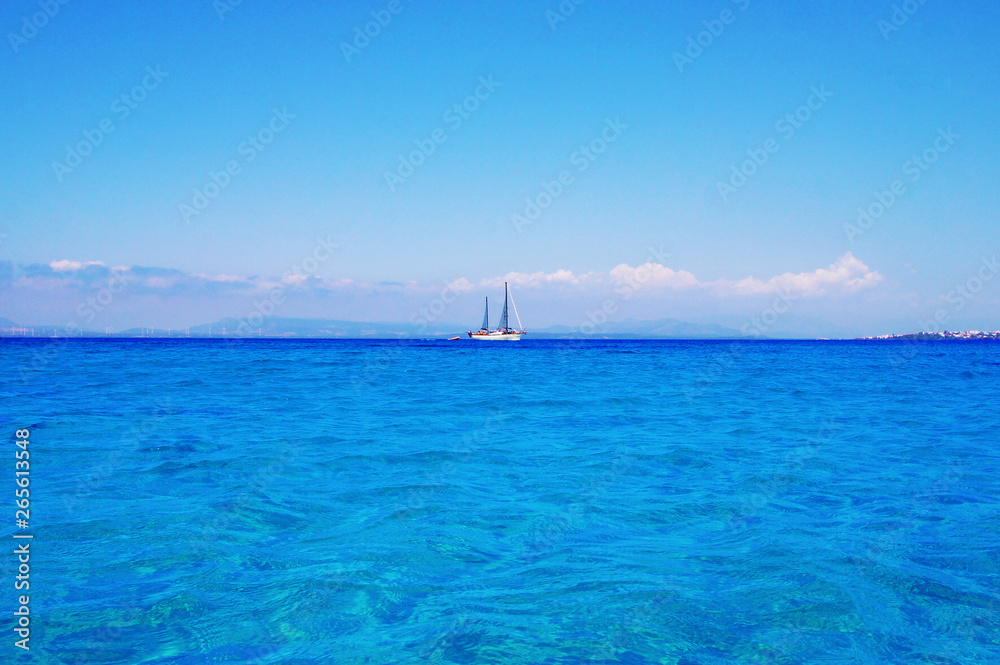 White ship yacht on the ocean blue sea horizon sky. Resort travel tourism transparent blue turquoise water in a tropical paradise for background.