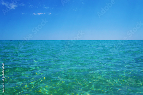 Transparent clean sunny ocean sea water waves for background and texture. © Payllik