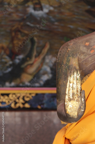 statue of buddha (detail) in a buddhist temple (Wat Pa Lelai) in Suphan Buri (Thailand) photo