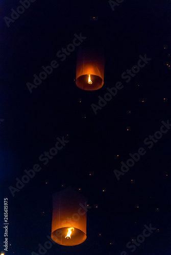 Light up lanterns flying to the sky at night