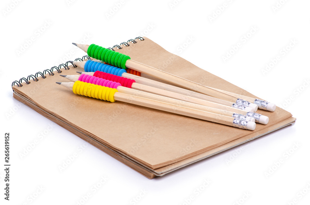Fototapeta premium notepad and pencils on white background isolation