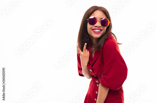 Portrait of expressive beautiful African-American girl possing on background © Ivan Traimak