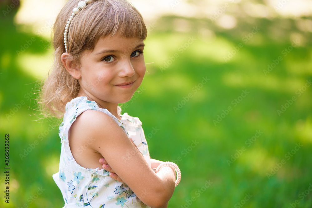 Llittle girl child outdoor in summer day. Llittle girl child outdoor in summer day.