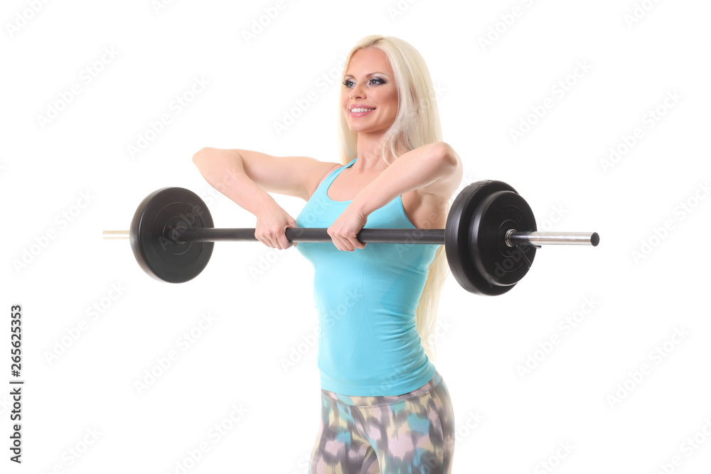 Obraz premium smiling sporty woman exercising with barbell